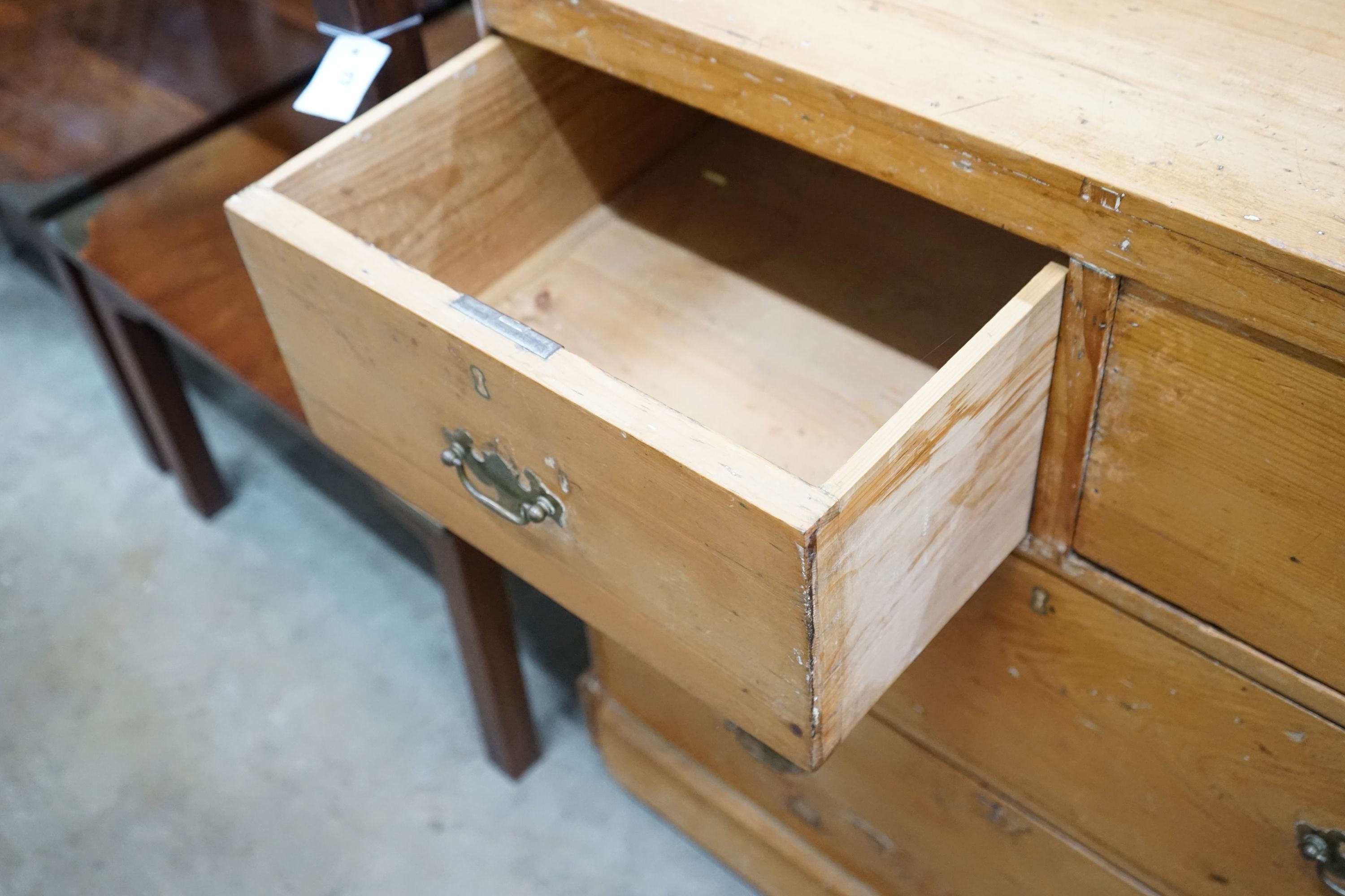 A Victorian stripped pine chest, width 82cm, depth 48cm, height 85cm and a toilet mirror